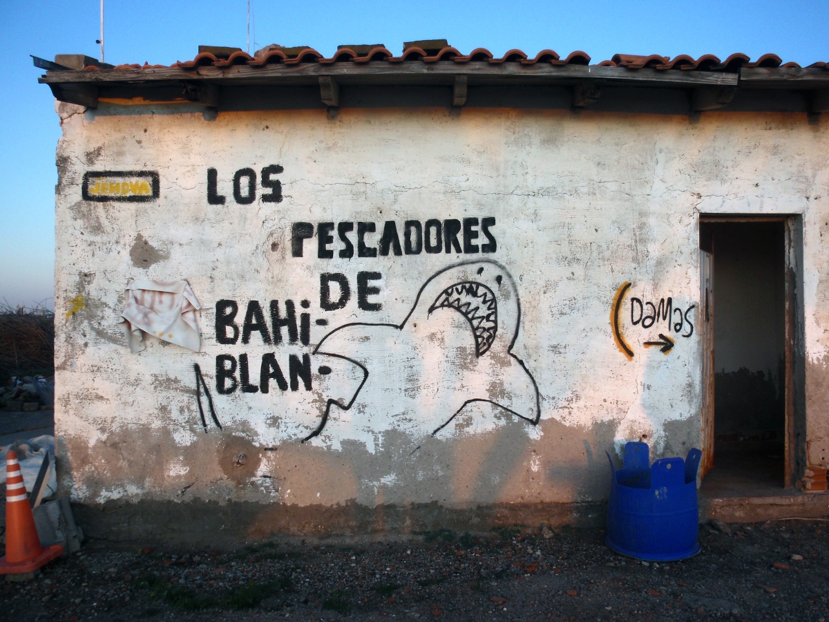 house with wall painting and writing